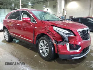 2023 Cadillac XT5 AWD Premium Luxury with VIN 1GYKNDRS6PZ137806, listed as a Copart auction lot 49639235 with 14,502 mi miles and Salvage Title. Bid and sale history available at DreamBid. Image 4.