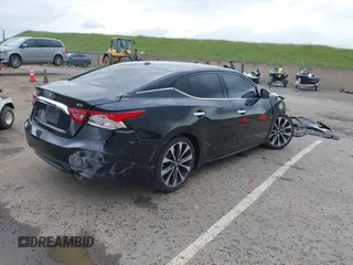2016 Nissan Maxima SV z VIN 1N4AA6AP8GC408857, wystawiony jako IAAI lot #41892425 z przebiegiem 185 487 mil mil oraz . Historia ofert i sprzedaży dostępna na DreamBid. Obrazek 4.