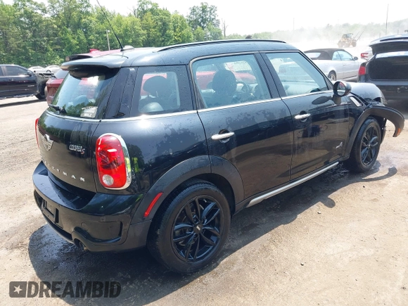 2015 MINI Countryman S with VIN WMWZC5C56FWP45115, listed as a IAAI auction lot 42426394 with 52,937 mi miles and . Bid and sale history available at DreamBid. Image 4.