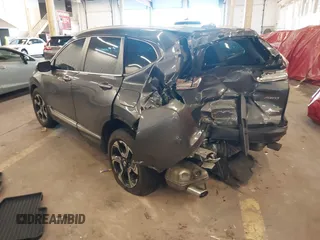 2018 Honda CR-V Touring with VIN 2HKRW2H91JH634457, listed as a IAAI auction lot 41697658 with 101,878 mi miles. Bid and sale history available at carsss.com. Image 3.