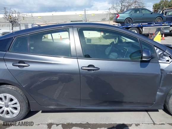 2022 Toyota Prius L Eco with VIN JTDKAMFU4N3177258, listed as a IAAI auction lot 39148811 with 50,902 mi miles. Bid and sale history available at carsss.com. Image 13.