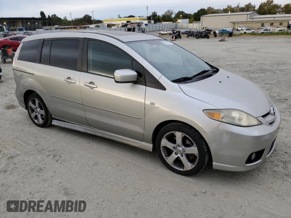 2007 Mazda 5 Touring with VIN JM1CR29L870139671, listed as a Copart auction lot 73526334 with 148,402 mi miles and Salvage Title. Bid and sale history available at DreamBid. Image 4.