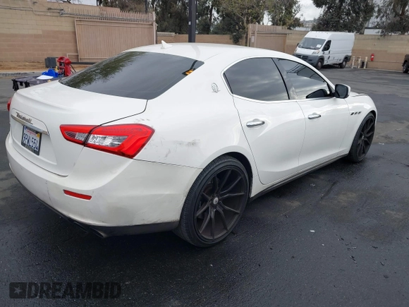 2014 Maserati Ghibli S Q4 with VIN ZAM57RTA3E1090350, listed as a IAAI auction lot 42056682 with 119,160 mi miles and . Bid and sale history available at DreamBid. Image 4.