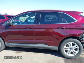 2019 Ford Edge SEL z VIN 2FMPK4J9XKBB10449, wystawiony jako IAAI lot #41614536 z przebiegiem 83 879 mil mil oraz . Historia ofert i sprzedaży dostępna na DreamBid. Obrazek 14.