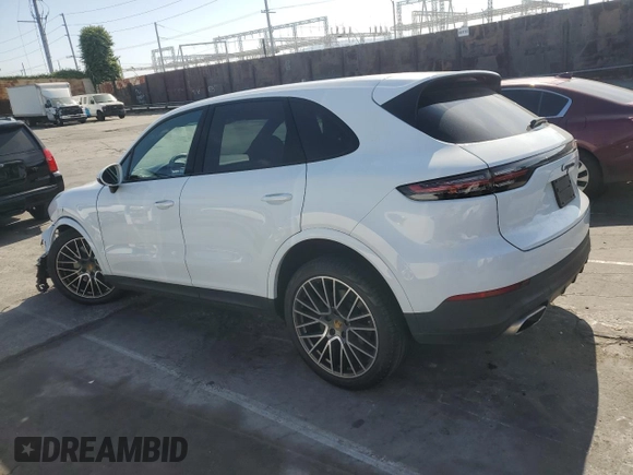 2021 Porsche Cayenne with VIN WP1AA2AYXMDA00148, listed as a Copart auction lot 52647565 with 27,977 mi miles and Salvage title. Bid and sale history available at DreamBid. Image 2.