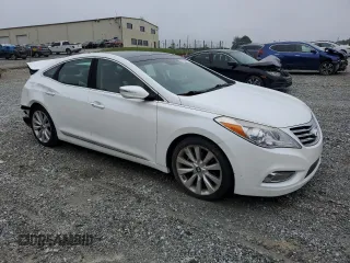 2014 Hyundai Azera Limited z VIN KMHFH4JG1EA388388, wystawiony jako Copart lot #58166675 z przebiegiem Nie podano mil oraz Szkoda całkowita • Salvage title. Historia ofert i sprzedaży dostępna na DreamBid. Obrazek 4.