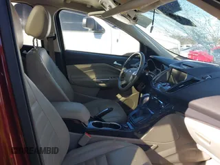 2015 Ford Escape Titanium with VIN 1FMCU0J92FUB55712, listed as a IAAI auction lot 41627867 with 156,438 mi miles. Bid and sale history available at carsss.com. Image 5.