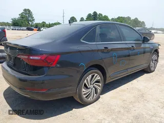 2020 Volkswagen Jetta SEL z VIN 3VWEB7BU2LM052964, wystawiony jako IAAI lot #42316780 z przebiegiem 79 929 mil mil oraz . Historia ofert i sprzedaży dostępna na DreamBid. Obrazek 4.