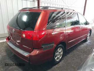 2009 Toyota Sienna CE with VIN 5TDZK23C89S265150, listed as a IAAI auction lot 42079867 with 211,467 mi miles. Bid and sale history available at carsss.com. Image 4.