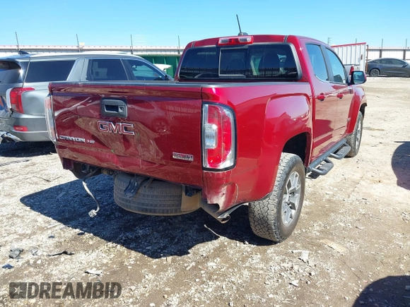 2019 GMC Canyon 4WD All Terrain w/Cloth with VIN 1GTG6FEN7K1343499, listed as a IAAI auction lot 41695869 with 163,702 mi miles. Bid and sale history available at carsss.com. Image 4.