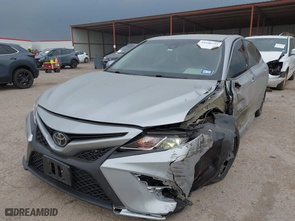 2018 Toyota Camry LE with VIN 4T1B11HK2JU079694, listed as a IAAI auction lot 41930753 with 171,984 mi miles. Bid and sale history available at carsss.com. Image 2.