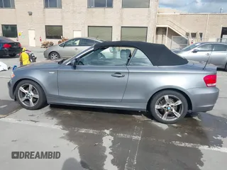 2012 BMW 1 Series 128i with VIN WBAUN1C52CVR00421, listed as a IAAI auction lot 41594256 with 107,957 mi miles and . Bid and sale history available at DreamBid. Image 14.