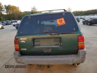 1997 Jeep Grand Cherokee TSi with VIN 1J4FX58SXVC565347, listed as a Copart auction lot 80953334 with 355,373 mi miles and Salvage Title. Bid and sale history available at carsss.com. Image 6.