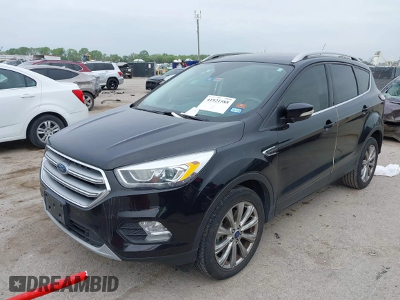 2017 Ford Escape Titanium with VIN 1FMCU0J93HUF10664, listed as a IAAI auction lot 41921588 with 88,377 mi miles. Bid and sale history available at carsss.com. Image 17.