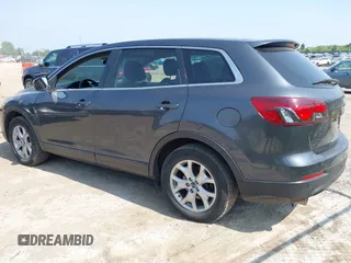 2014 Mazda CX-9 Touring z VIN JM3TB3CA4E0431520, wystawiony jako IAAI lot #42514932 z przebiegiem 119 837 mil mil oraz . Historia ofert i sprzedaży dostępna na DreamBid. Obrazek 3.
