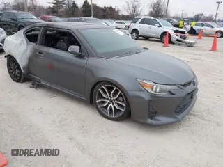 2015 Scion tC with VIN JTKJF5C72F3089756, listed as a IAAI auction lot 41554749 with 66,883 mi miles. Bid and sale history available at carsss.com. Image 1.