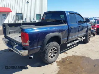 2005 Dodge Ram 3500 SLT with VIN 3D7LS38CX5G847351, listed as a IAAI auction lot 41649246 with 260,590 mi miles. Bid and sale history available at carsss.com. Image 4.