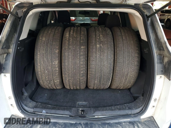 2013 Ford Escape SE with VIN 1FMCU9G92DUD72105, listed as a IAAI auction lot 42731657 with 213,477 mi miles and . Bid and sale history available at DreamBid. Image 18.