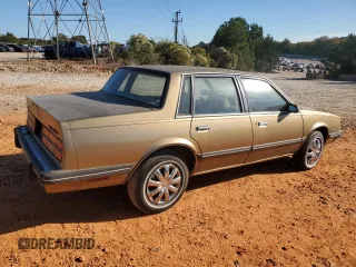 1985 Chevrolet Celebrity z VIN 2G1AW19R2F1120933, wystawiony jako Copart lot #75407474 z przebiegiem 78 007 mil mil oraz Szkody całkowita. Historia ofert i sprzedaży dostępna na DreamBid. Obrazek 3.