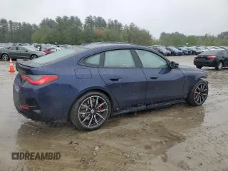 2022 BMW 4 Series M440i xDrive with VIN WBA13AW04NFM50227, listed as a Copart auction lot 55770745 with 36,788 mi miles and Salvage title. Bid and sale history available at DreamBid. Image 3.