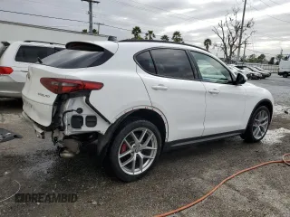2019 Alfa Romeo Stelvio Ti with VIN ZASPAKBN2K7C58702, listed as a Copart auction lot 47459585 with 49,393 mi miles and Salvage title. Bid and sale history available at DreamBid. Image 3.