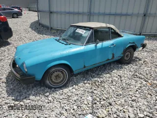 1977 FIAT 124 Spider z VIN 124CS10118953, wystawiony jako Copart lot #62811144 z przebiegiem 81 215 mil mil oraz Czysty tytuł • Clean title. Historia ofert i sprzedaży dostępna na DreamBid. Obrazek 1.