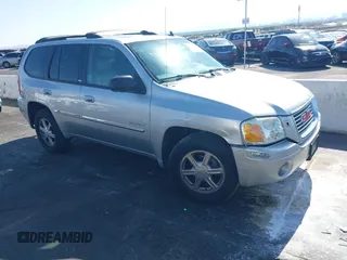 2006 GMC Envoy SLT with VIN 1GKDT13S762295532, listed as a IAAI auction lot 42319037 with 171,692 mi miles and . Bid and sale history available at DreamBid. Image 1.