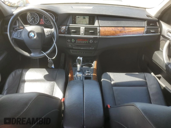 2012 BMW X5 35i with VIN 5UXZV4C5XCL751020, listed as a Copart auction lot 59327845 with 106,249 mi miles and Salvage title. Bid and sale history available at DreamBid. Image 8.