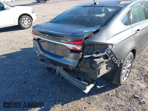 2017 Ford Fusion SE with VIN 3FA6P0H71HR369779, listed as a IAAI auction lot 40942962 with 123,956 mi miles and . Bid and sale history available at DreamBid. Image 6.