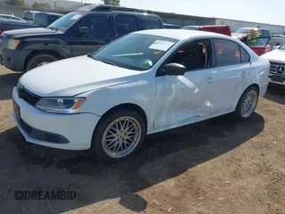 2014 Volkswagen Jetta Sedan S with VIN 3VW1K7AJ7EM439342, listed as a IAAI auction lot 41626534 with 184,935 mi miles. Bid and sale history available at carsss.com. Image 2.