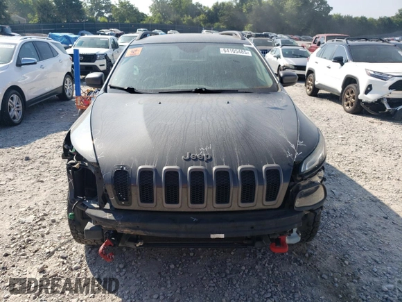 2014 Jeep Cherokee Trailhawk with VIN 1C4PJMBS1EW304718, listed as a Copart auction lot 64105485 with 151,315 mi miles and Salvage title. Bid and sale history available at DreamBid. Image 5.