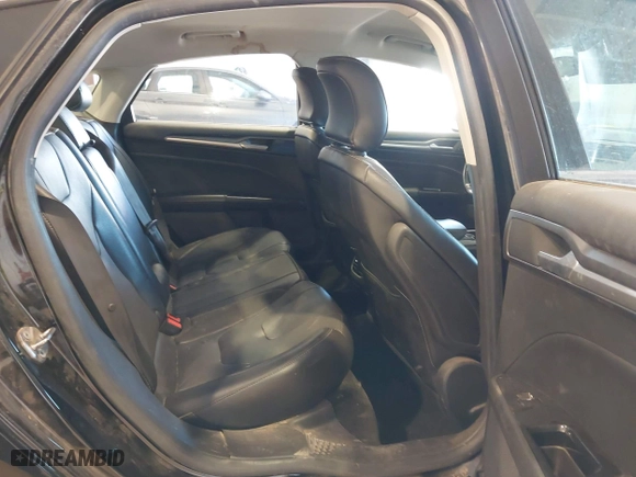 2016 Ford Fusion Titanium Hybrid with VIN 3FA6P0RU7GR127307, listed as a IAAI auction lot 41944427 with 128,076 mi miles. Bid and sale history available at carsss.com. Image 8.
