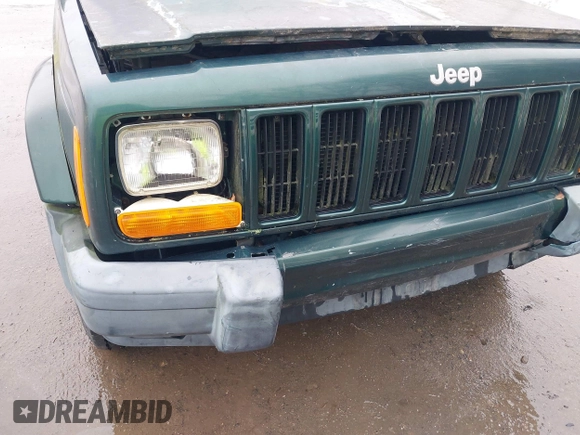 1999 Jeep Cherokee Sport with VIN 1J4FF68S8XL554570, listed as a IAAI auction lot 41737417 with 98,678 mi miles and . Bid and sale history available at DreamBid. Image 6.