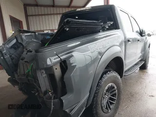 2020 Ford F-150 Raptor with VIN 1FTFW1RG3LFB74922, listed as a IAAI auction lot 41953753 with 93,780 mi miles and . Bid and sale history available at carsss.com. Image 4.