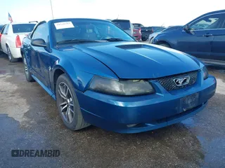 1999 Ford Mustang GT z VIN 1FAFP45X5XF184464, wystawiony jako IAAI lot #41526783 z przebiegiem 162 466 mil mil oraz . Historia ofert i sprzedaży dostępna na DreamBid. Obrazek 1.
