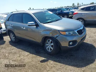 2012 Kia Sorento LX with VIN 5XYKT4A23CG268160, listed as a IAAI auction lot 41814097 with 126,620 mi miles. Bid and sale history available at carsss.com. Image 1.