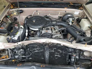 1992 Isuzu Pickup S z VIN 4S1CL11L0N4208813, wystawiony jako Copart lot #80966344 z przebiegiem 166 056 mil mil oraz Szkody całkowita. Historia ofert i sprzedaży dostępna na DreamBid. Obrazek 12.