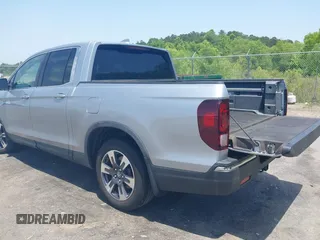 2018 Honda Ridgeline RTL z VIN 5FPYK2F5XJB001064, wystawiony jako IAAI lot #42252956 z przebiegiem 95 272 mil mil oraz . Historia ofert i sprzedaży dostępna na DreamBid. Obrazek 3.