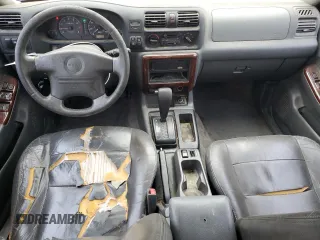 2000 Isuzu Rodeo S with VIN 4S2CK58W8Y4351180, listed as a Copart auction lot 44648595 with 375,829 mi miles and Salvage title. Bid and sale history available at DreamBid. Image 8.