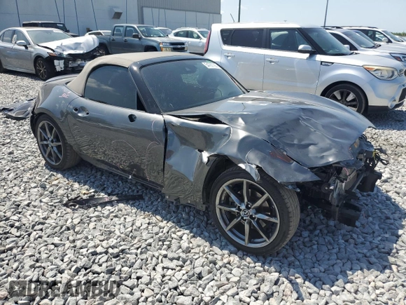 2020 Mazda MX-5 Miata Grand Touring z VIN JM1NDAD77L0414873, wystawiony jako Copart lot #54767785 z przebiegiem 47 579 mil mil oraz Szkoda całkowita • Salvage title. Historia ofert i sprzedaży dostępna na DreamBid. Obrazek 4.