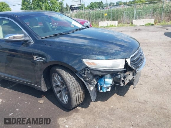 2014 Ford Taurus Limited z VIN 1FAHP2F85EG125118, wystawiony jako IAAI lot #42457437 z przebiegiem 129 406 mil mil oraz . Historia ofert i sprzedaży dostępna na DreamBid. Obrazek 6.