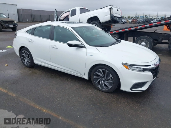 2021 Honda Insight Touring with VIN 19XZE4F96ME000099, listed as a IAAI auction lot 41533789 with 83,490 mi miles and . Bid and sale history available at carsss.com. Image 1.