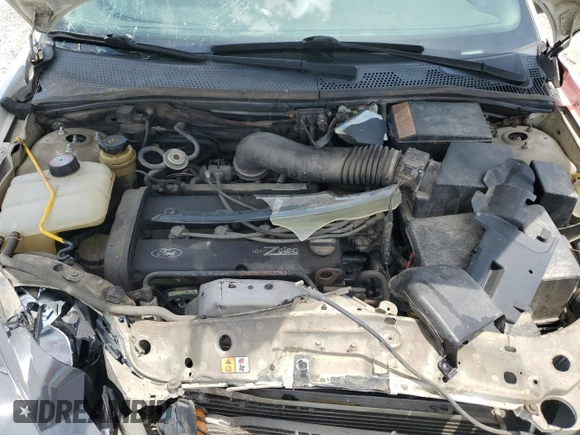 2003 Ford Focus ZX3 with VIN 3FAFP31383R117755, listed as a Copart auction lot 60668725 with 135,856 mi miles and Salvage title. Bid and sale history available at DreamBid. Image 11.