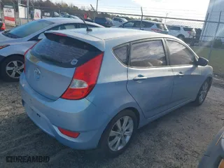 2012 Hyundai Accent SE with VIN KMHCU5AE2CU019828, listed as a IAAI auction lot 41904860 with 151,171 mi miles. Bid and sale history available at carsss.com. Image 4.
