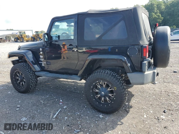 2011 Jeep Wrangler Sahara with VIN 1J4AA5D15BL552185, listed as a Copart auction lot 63065185 with 159,850 mi miles and Salvage title. Bid and sale history available at DreamBid. Image 2.