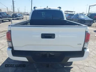 2023 Toyota Tacoma SR5 z VIN 3TMDZ5BN3PM160975, wystawiony jako IAAI lot #42024778 z przebiegiem 41 621 mil mil oraz . Historia ofert i sprzedaży dostępna na DreamBid. Obrazek 15.