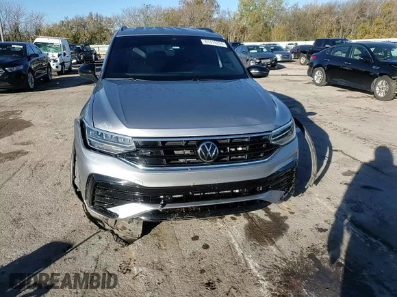 2022 Volkswagen Tiguan SE R-Line Black с VIN 3VVCB7AX1NM035874, выставлен на аукционе Copart как лот 81419224 с пробегом Не указан миль и Списание • Salvage title. История ставок и продаж доступна на DreamBid. Изображение 11.