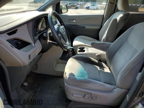 2015 Toyota Sienna LE AAS with VIN 5TDKK3DCXFS651621, listed as a Copart auction lot 66263885 with 150,578 mi miles and Salvage title. Bid and sale history available at DreamBid. Image 7.