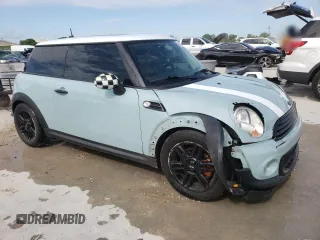 2012 MINI Hardtop with VIN WMWSU3C52CT367682, listed as a Copart auction lot 63045965 with 124,683 mi miles and Salvage title. Bid and sale history available at DreamBid. Image 4.