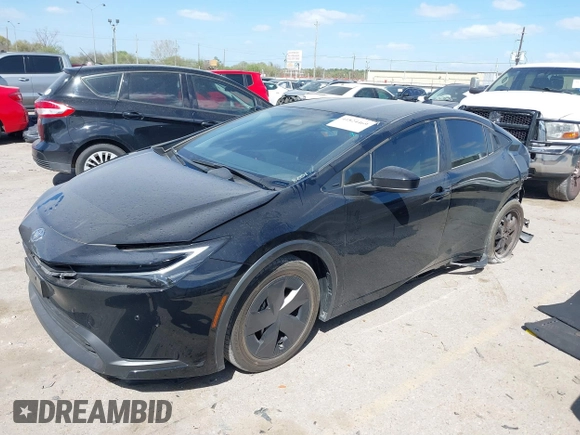 2023 Toyota Prius LE with VIN JTDACAAUXP3008201, listed as a IAAI auction lot 41824469 with 27,864 mi miles and . Bid and sale history available at carsss.com. Image 2.